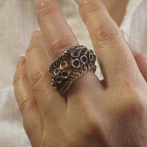 octopus tentacle adjustable ring in silver and brass