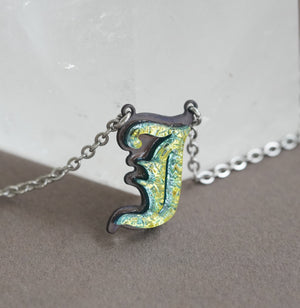Initial letter Necklace J Old English Font Gold color Fused Dichroic Glass on a Stainless Steel base