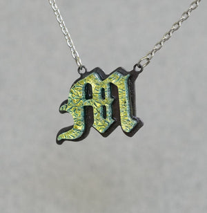 Initial letter Necklace M Old English Font Gold color Fused Dichroic Glass on a Stainless Steel base