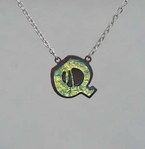 Initial letter Necklace Q Old English Font Gold color Fused Dichroic Glass on a Stainless Steel base