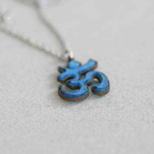 Om Pendant Fused glass with a Bezel