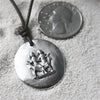 Gemini zodiac charm necklace, white metal on leather cord
