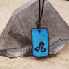 Leo zodiac necklace, rectangle turquoise dichroic glass pendant