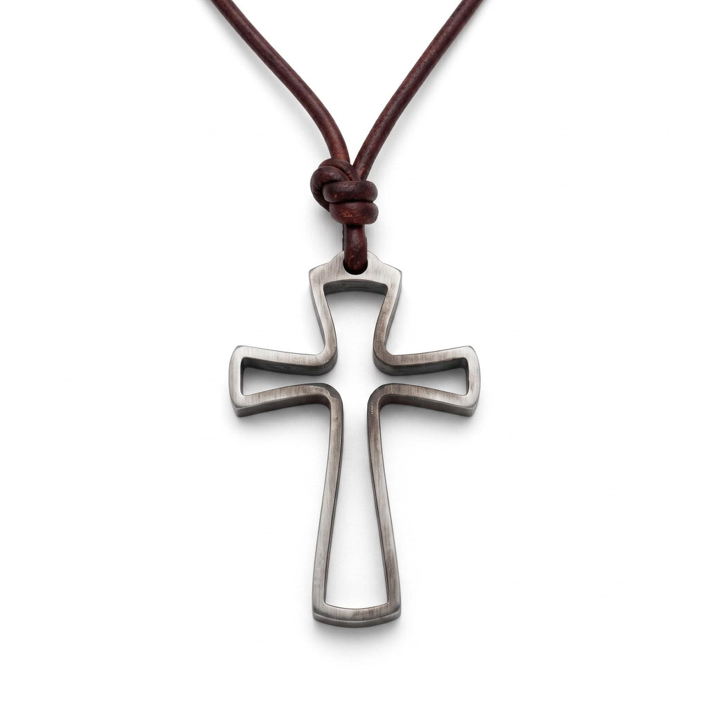 Mens cross necklace, open outline stainless steel cross pendant on a brown leather cord with a sliding knot, on a white background