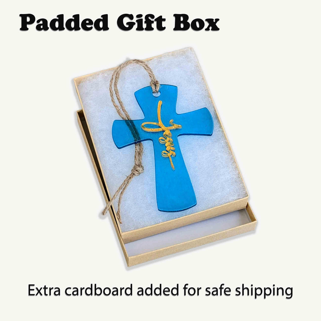 Turquoise glass cross ornament in padded gift box