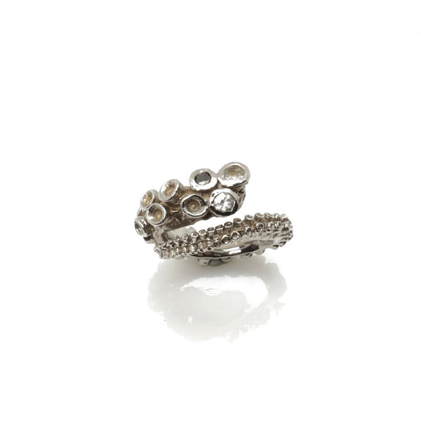 14k white gold octopus tentacle ring product photo, top-down view on white background