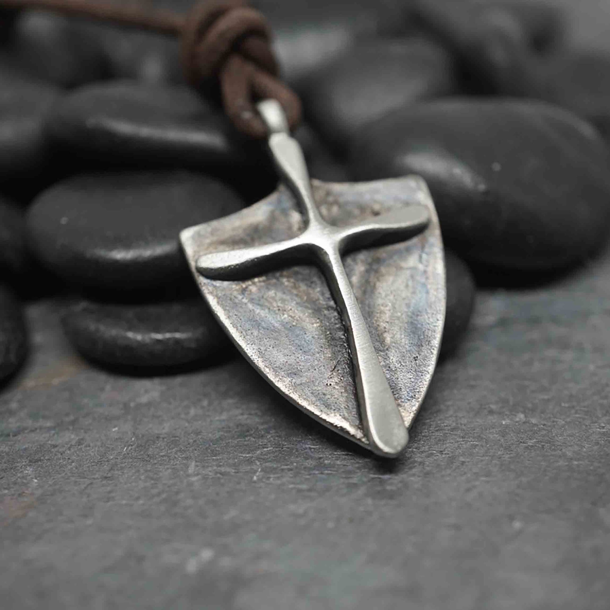 Pewter cross on shield style pendant made of pewter 