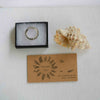 Small octopus tentacle ring in sterling silver, arrives in gift box packaging