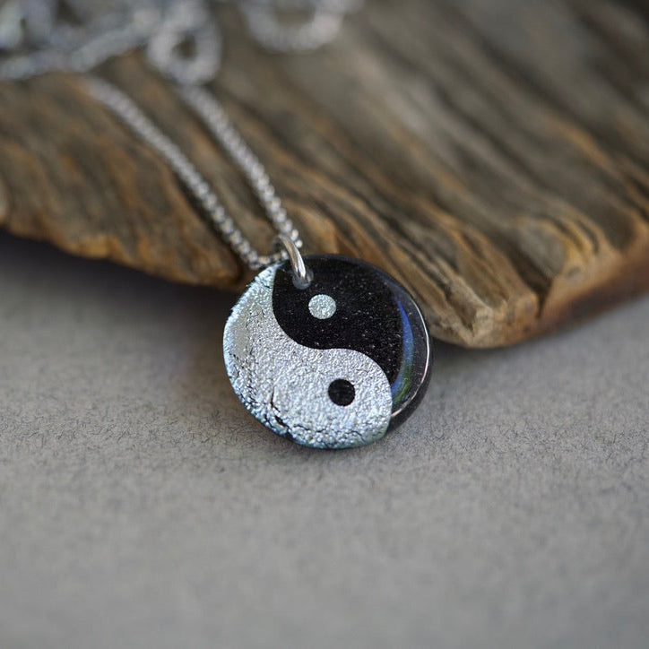 yin yand fused silver color dichroic glass on black base