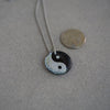 yin yand fused silver color dichroic glass on black base