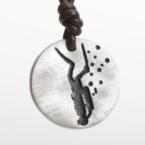 Satin pewter scuba diver coin pendant with a black epoxy filled diver image