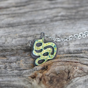 Initial letter Necklace S Old English Font Gold color Fused Dichroic Glass on a Stainless Steel base