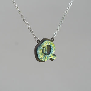 Initial letter Necklace Q Old English Font Gold color Fused Dichroic Glass on a Stainless Steel base