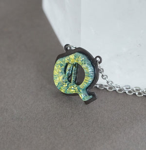 Initial letter Necklace Q Old English Font Gold color Fused Dichroic Glass on a Stainless Steel base