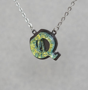 Initial letter Necklace Q Old English Font Gold color Fused Dichroic Glass on a Stainless Steel base