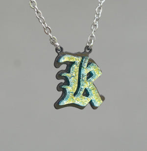 Initial letter Necklace K Old English Font Gold color Fused Dichroic Glass on a Stainless Steel base