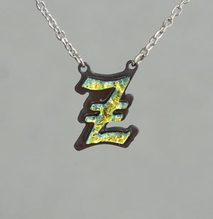 Z  Initial letter Necklace Old English Font Gold color Fused Dichroic Glass on a Stainless Steel base