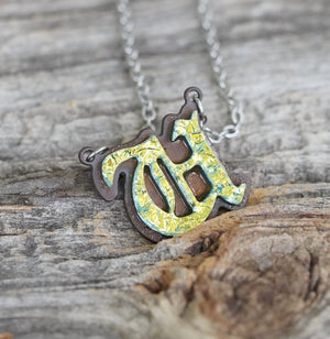 Initial letter Necklace U Old English Font Gold color Fused Dichroic Glass on a Stainless Steel base