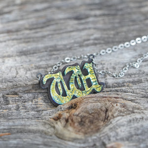 Initial letter Necklace W Old English Font Gold color Fused Dichroic Glass on a Stainless Steel base