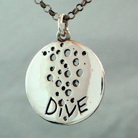 Seven eighths inch round silver diver coin pendant, hand carved in wax