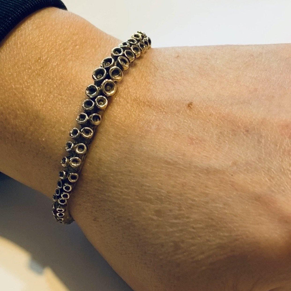 Octopus tentacle cuff bracelet, side angle
