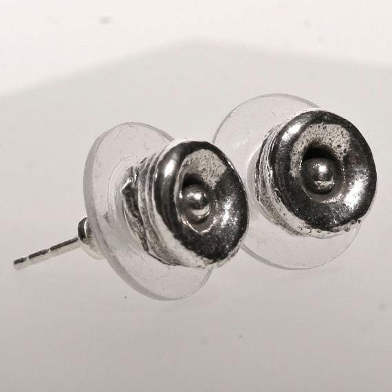 Octopus tentacle post earrings in sterling silver, close-up