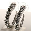 Octopus tentacle hoop earrings, size comparison