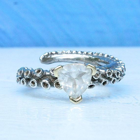 Octopus tentacle ring in 14k white gold with white topaz stone, front view
