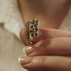 Handcrafted octopus ring in recycled sterling silver with antique suction cup detail