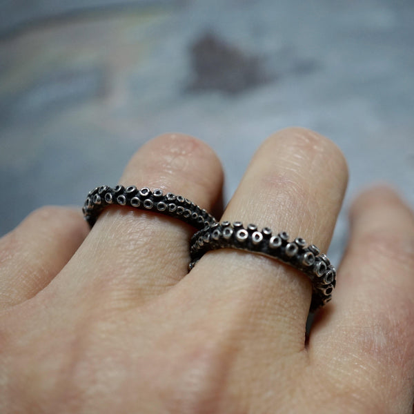 Octopus tentacle two-finger ring in sterling silver, front view
