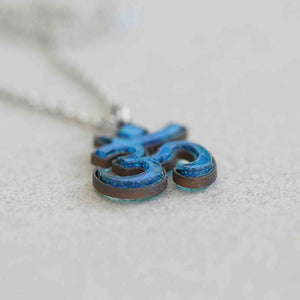 Om Pendant Fused glass with a Bezel