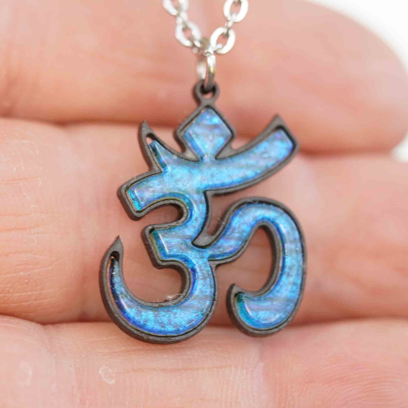 Om Pendant Fused glass with a Bezel