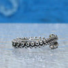 Small octopus tentacle ring, close-up of suction cup detail